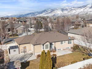 Snowy aerial view with a mountain view