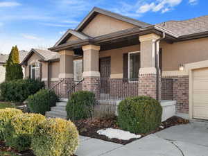 View of front of property featuring a garage