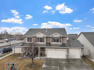 View of front property with a garage