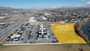 Birds eye view of property with a mountain view