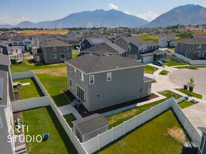 Birds eye view of property featuring a mountain view