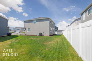 View of yard featuring cooling unit