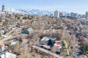 Birds eye view of property with a mountain view and a city view