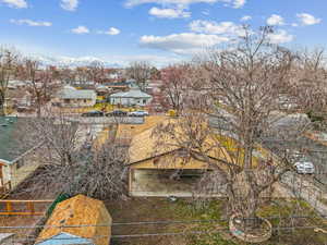 Birds eye view of property with a mountain view