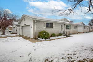 Single story home featuring a garage