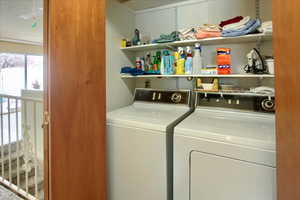 Laundry area featuring washer and clothes dryer