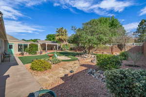 View of yard featuring a fenced backyard