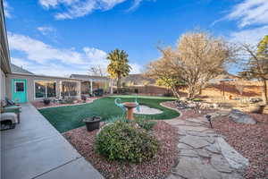 View of yard with a patio and a pergola