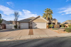 View of front of property with a garage