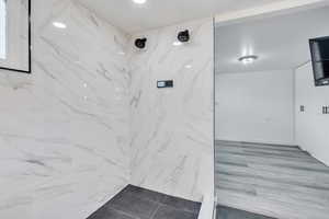 Interior space with tiled shower