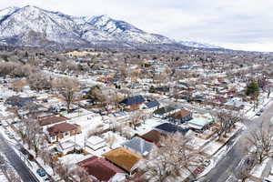 Snowy aerial view with a mountain view