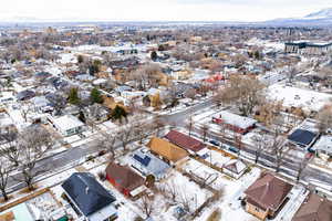 Snowy aerial view featuring a mountain view