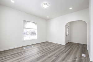 Spare room featuring light hardwood / wood-style floors