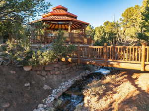 Exterior space featuring a deck and a gazebo