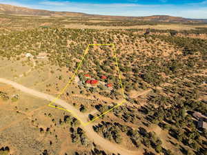 Birds eye view of property with a mountain view