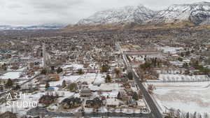 Snowy aerial view with a mountain view