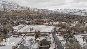 Snowy aerial view with a mountain view