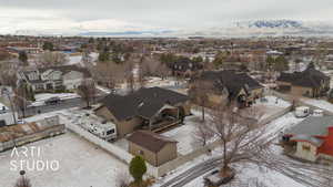 Snowy aerial view with a mountain view