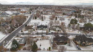 Snowy aerial view with a mountain view