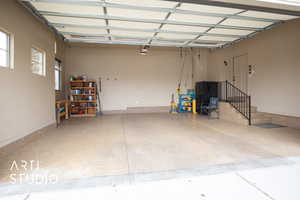 Garage featuring a garage door opener