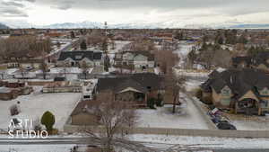 Snowy aerial view with a mountain view