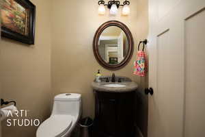 Bathroom with vanity and toilet