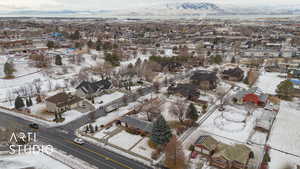 Snowy aerial view with a mountain view