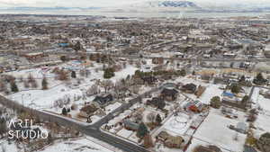 Snowy aerial view with a mountain view