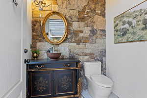 Bathroom with vanity and toilet