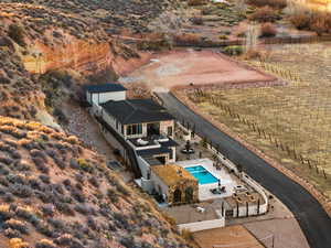 Birds eye view of property with a rural view