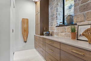 Bathroom with vanity and tile patterned flooring