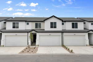 View of front property with a garage