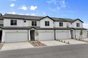 View of front facade with a garage