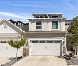 Craftsman house with a garage