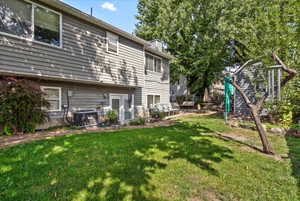 View of yard featuring central AC