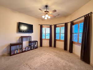 Interior space featuring ceiling fan