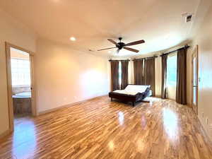 Unfurnished bedroom featuring ceiling fan and light hardwood / wood-style floors