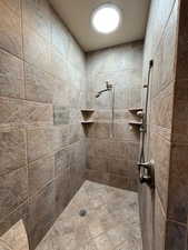 Bathroom with tiled shower