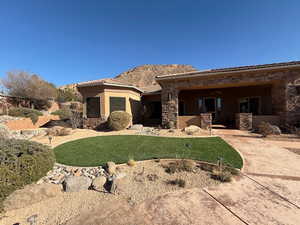 View of front of home featuring a front yard