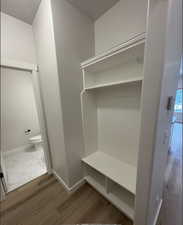 Mudroom featuring hardwood / wood-style flooring and a textured ceiling