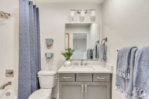 Bathroom with vanity and toilet