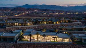 Aerial view at dusk featuring a mountain view