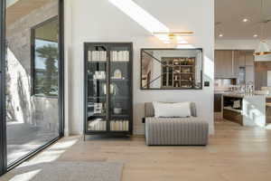 Sitting room featuring light hardwood / wood-style floors