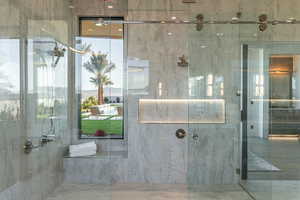 Bathroom featuring walk in shower