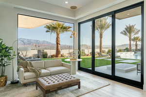 Interior space with a mountain view and light hardwood / wood-style flooring