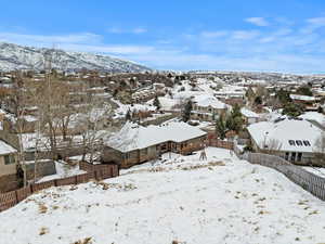 Snowy aerial view featuring a mountain view