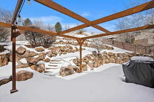 View of yard layered in snow