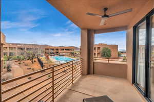 Balcony featuring ceiling fan