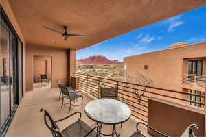 Balcony with ceiling fan and a mountain view