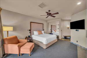 Bedroom with a closet and ceiling fan